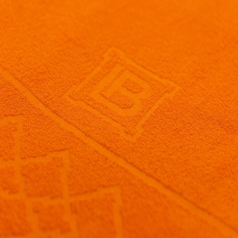 Telo Mare Laura Biagiotti con frange Tiaki Arancio